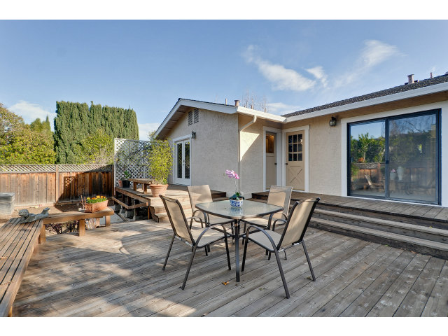 21841 McClellan Road Cupertino, CA 95014 - Photo 25 of 25 a view of a patio with table and chairs and potted plants