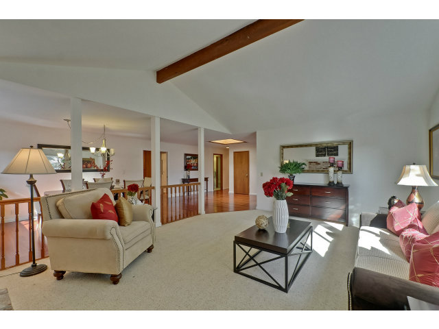 21841 McClellan Road Cupertino, CA 95014 - Photo 4 of 25 a living room with furniture and kitchen view