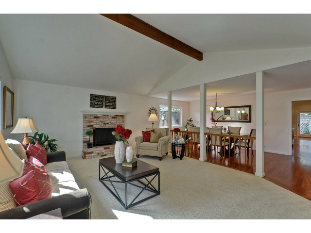 21841 McClellan Road Cupertino, CA 95014 - Photo 5 of 25 a living room with furniture and a flat screen tv