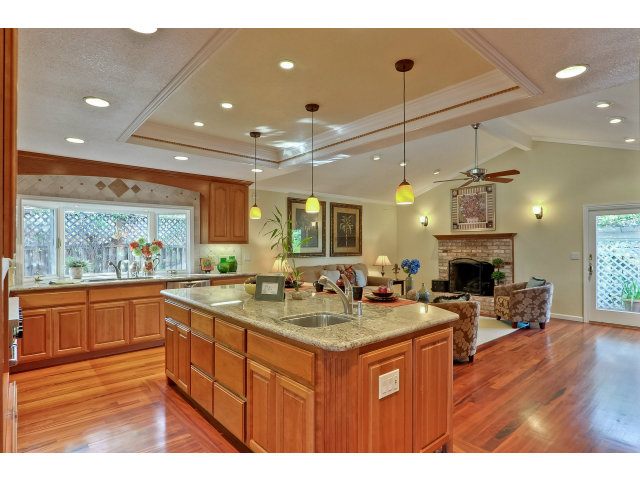 21841 McClellan Road Cupertino, CA 95014 - Photo 8 of 25 a kitchen with sink and cabinets