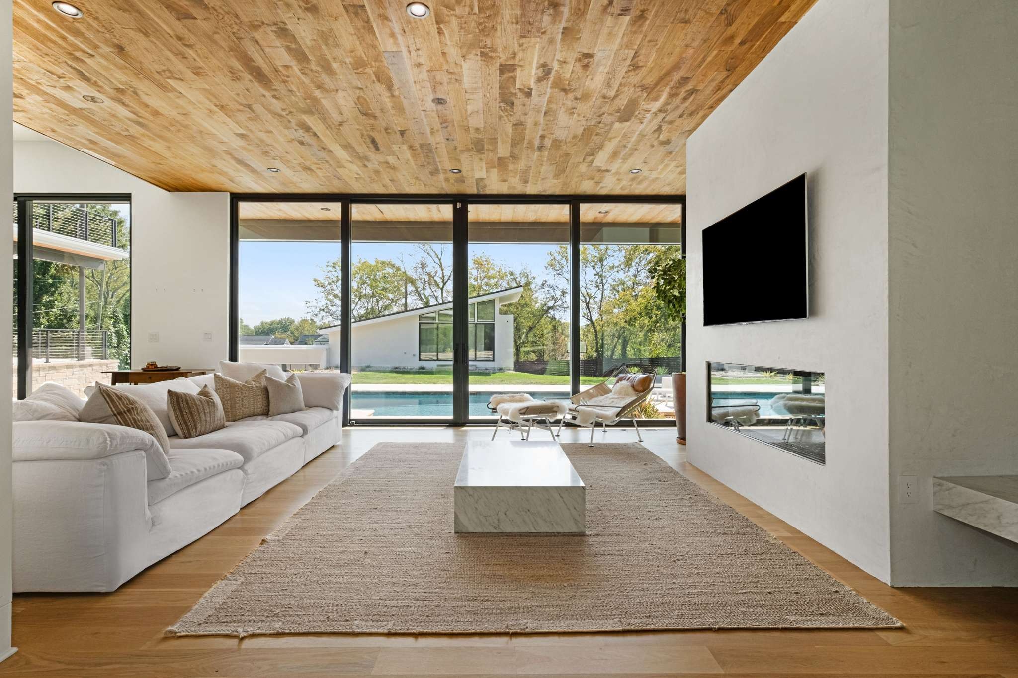6133 Robin Hill Road Nashville, TN 37205 - Photo 11 of 47 a living room with furniture and a flat screen tv