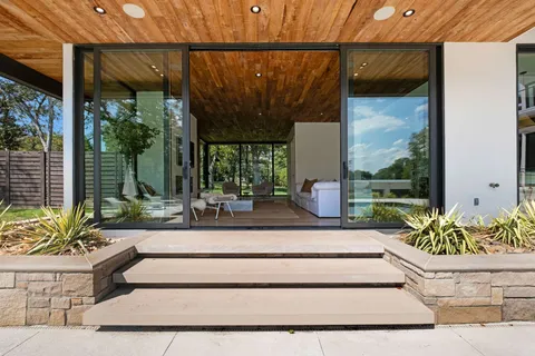 a view of a living room and a porch