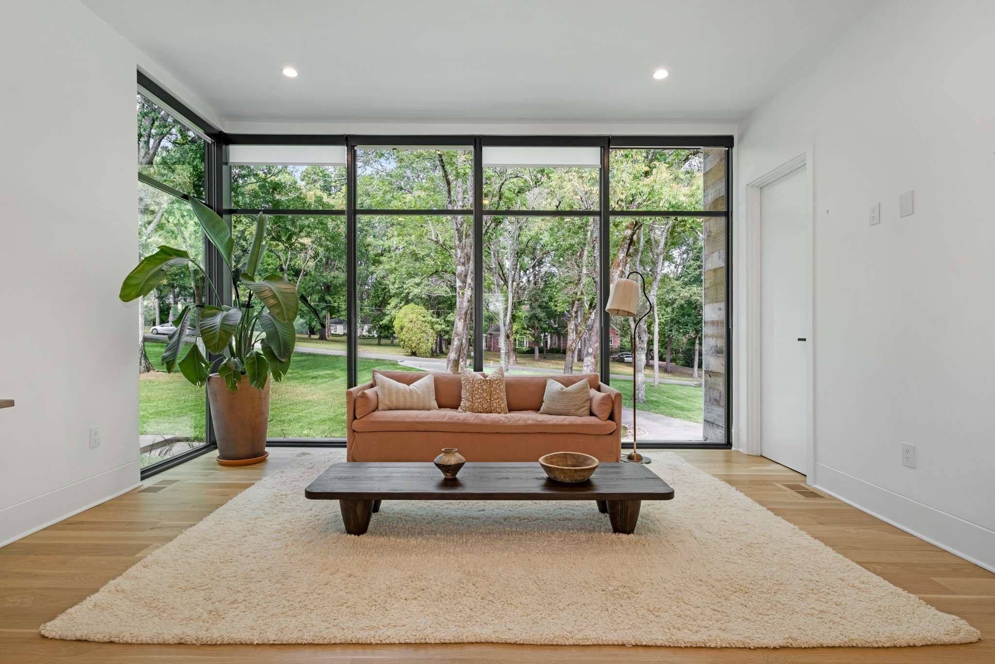 6133 Robin Hill Road Nashville, TN 37205 - Photo 16 of 47 a living room with furniture and a large window