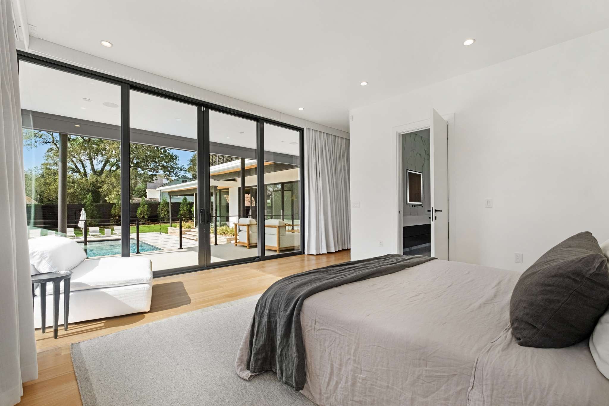 6133 Robin Hill Road Nashville, TN 37205 - Photo 19 of 47 a bedroom with a bed and a large window