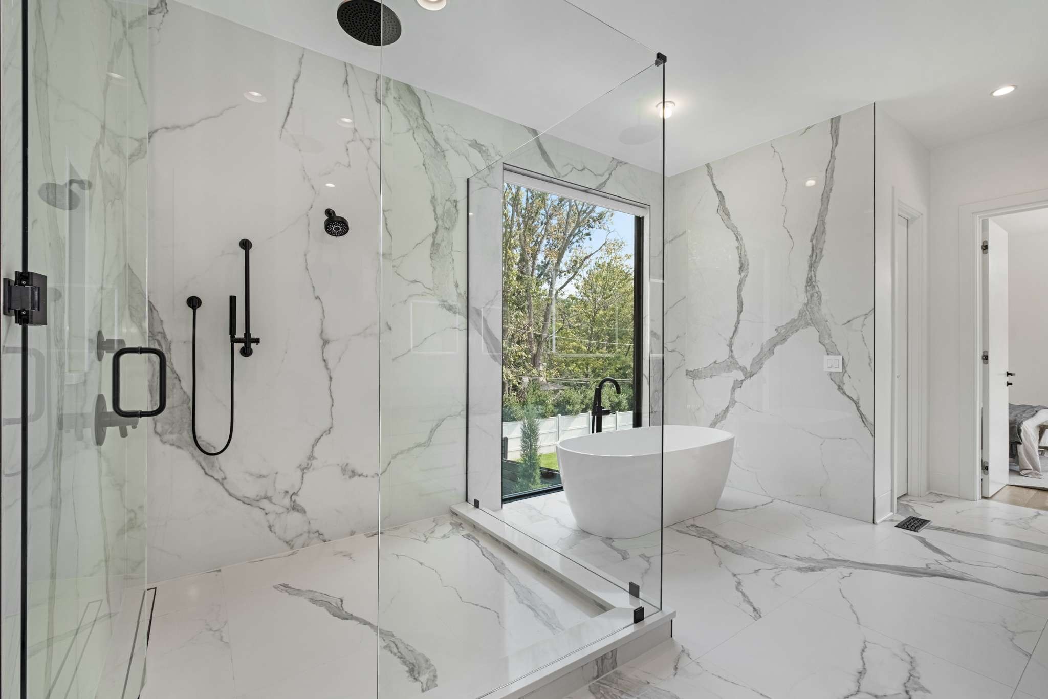 6133 Robin Hill Road Nashville, TN 37205 - Photo 22 of 47 a bathroom with a bathtub and a shower