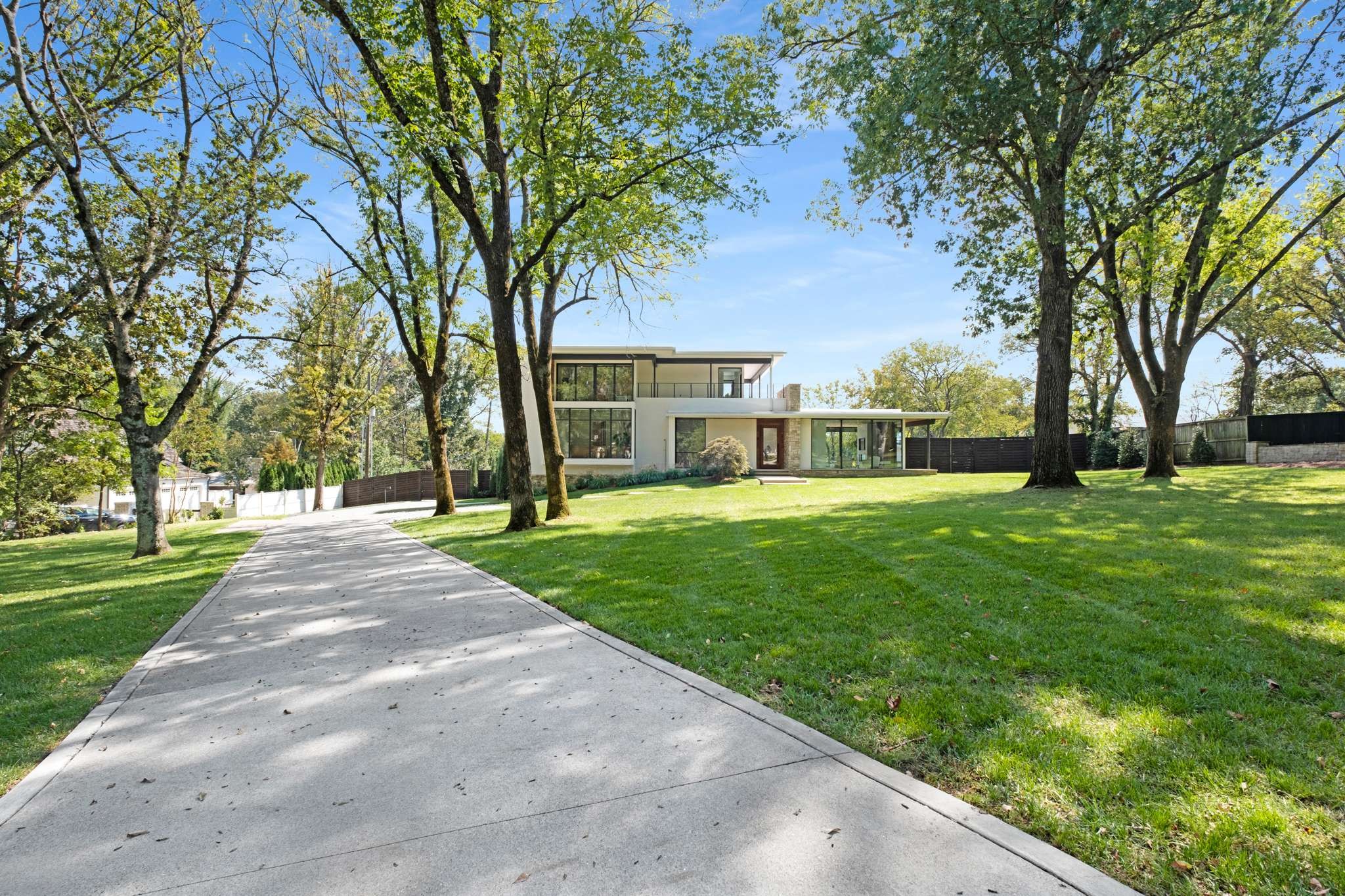 6133 Robin Hill Road Nashville, TN 37205 - Photo 3 of 47 a view of a park with large trees