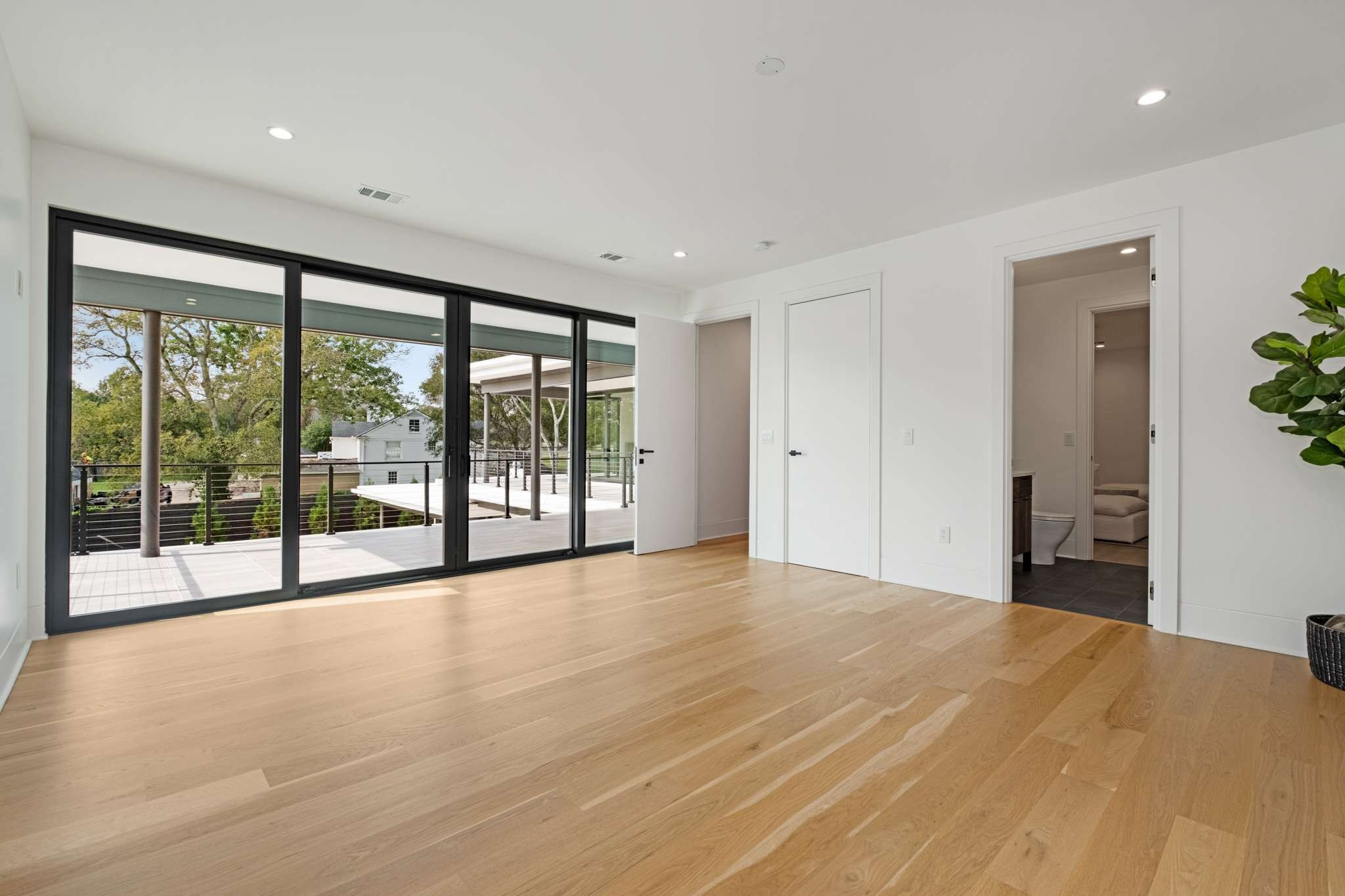 6133 Robin Hill Road Nashville, TN 37205 - Photo 33 of 47 a view of an empty room with a sliding door