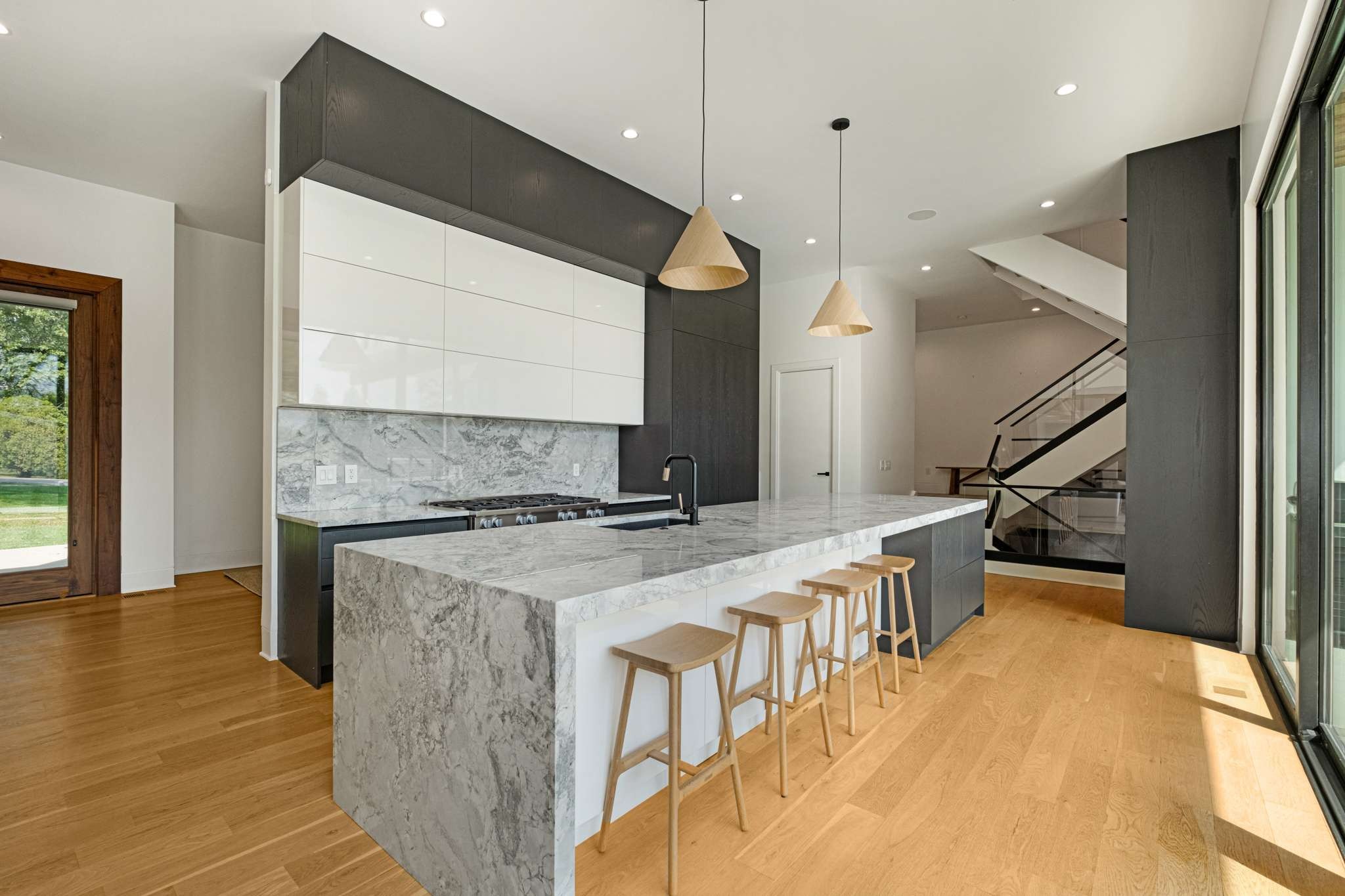 6133 Robin Hill Road Nashville, TN 37205 - Photo 8 of 47 a kitchen with a stove and a wooden floor