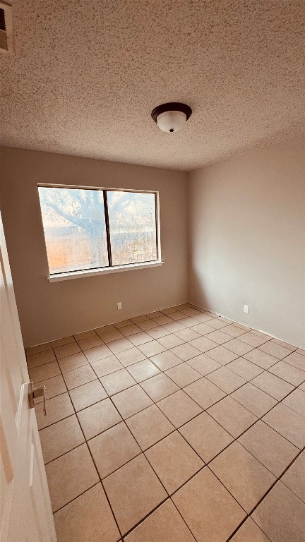 11320 Walnut Ridge Drive, Unit B Austin, TX 78753 - Photo 7 of 12 a view of an empty room and window