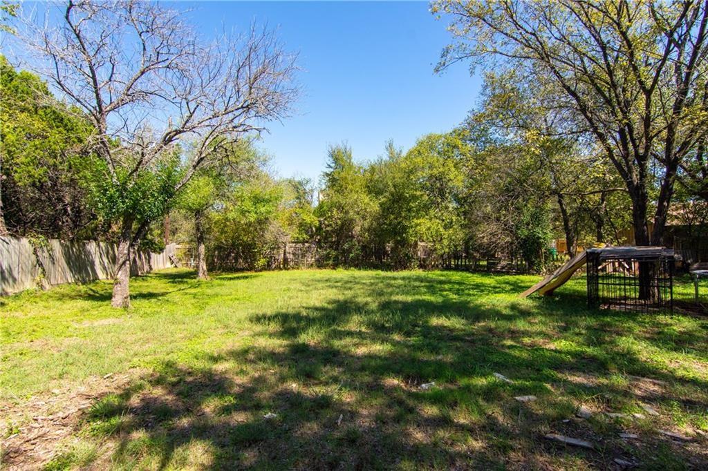 11320 Walnut Ridge Drive, Unit B Austin, TX 78753 - Photo 10 of 12 a swimming pool with outdoor seating and yard