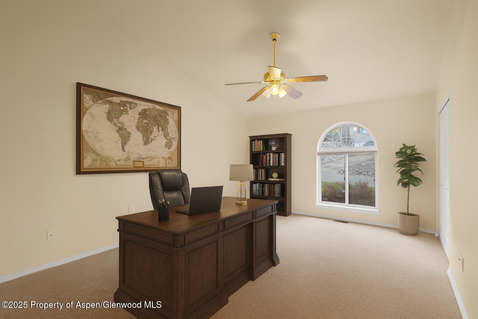 634 East First Street New Castle, CO 81647 - Photo 11 of 46 a living room with furniture a chandelier and a window