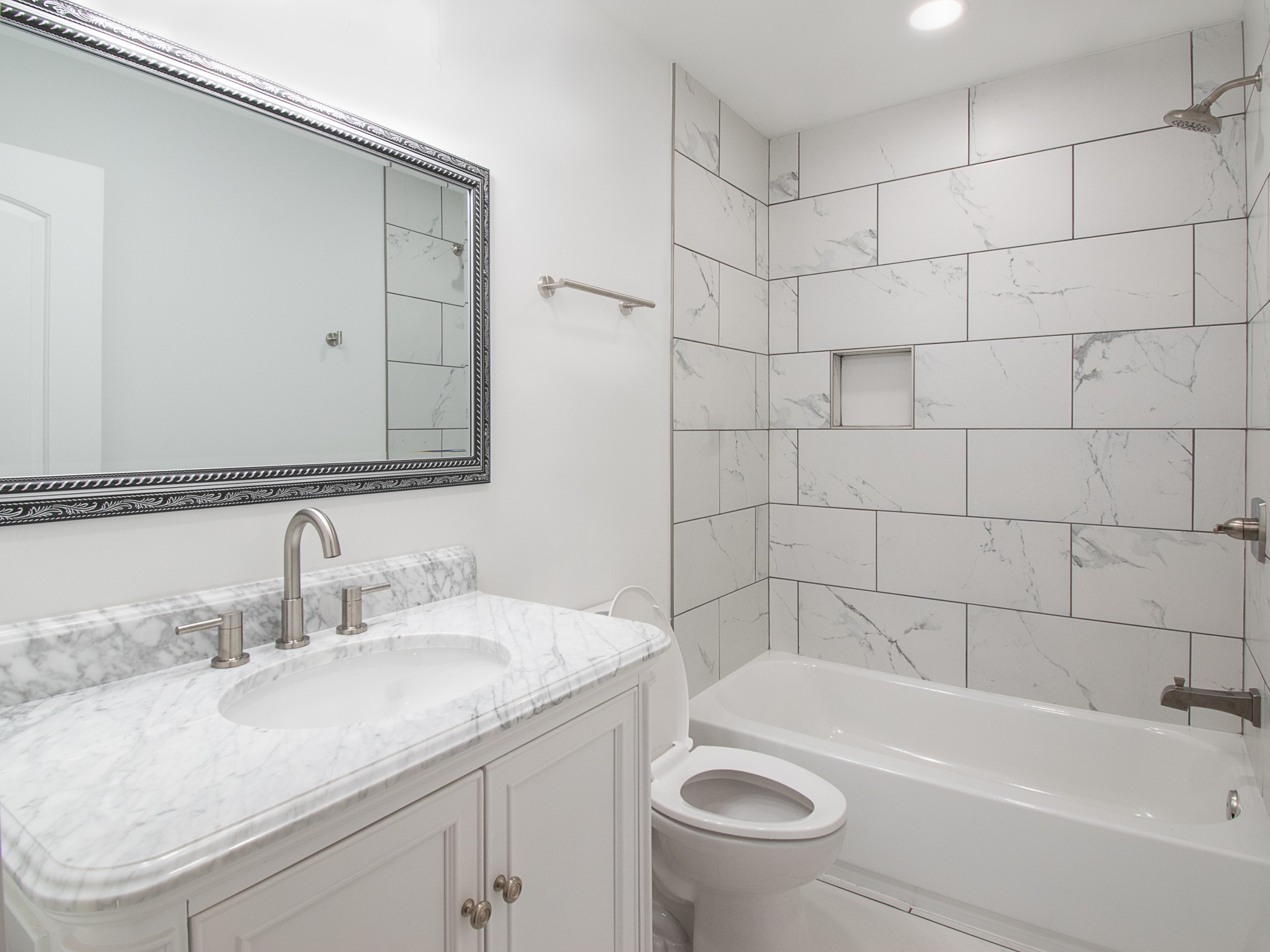 909 Ward Road Madison, TN 37115 - Photo 22 of 29 a bathroom with a sink a toilet and bathtub
