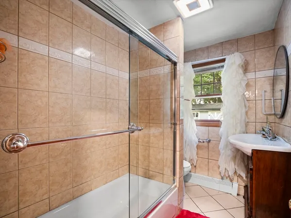 a bathroom with a sink and a shower
