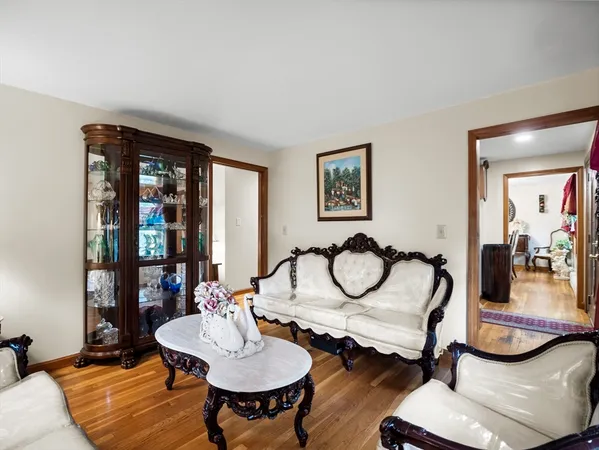 a view of a livingroom with furniture and window