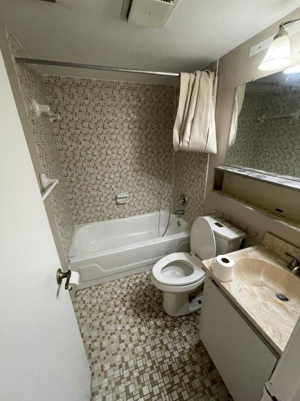 275 Gate Road, Unit 204 Hollywood, FL 33024 - Photo 3 of 6 a bathroom with a sink toilet and shower