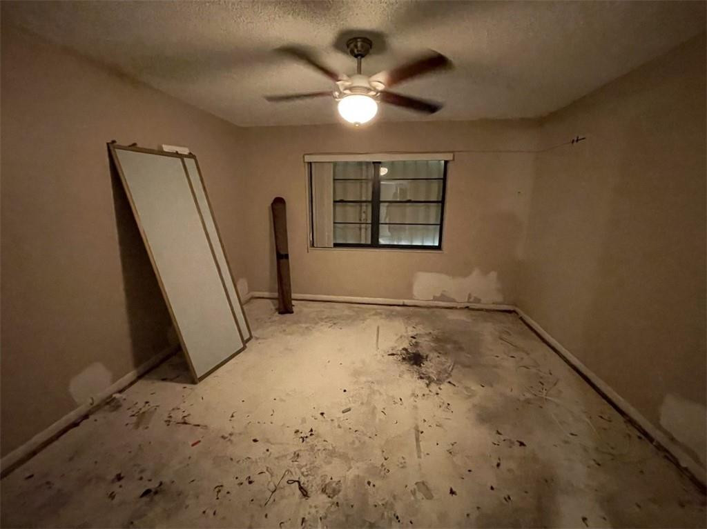 275 Gate Road, Unit 204 Hollywood, FL 33024 - Photo 6 of 6 a view of a livingroom with a window