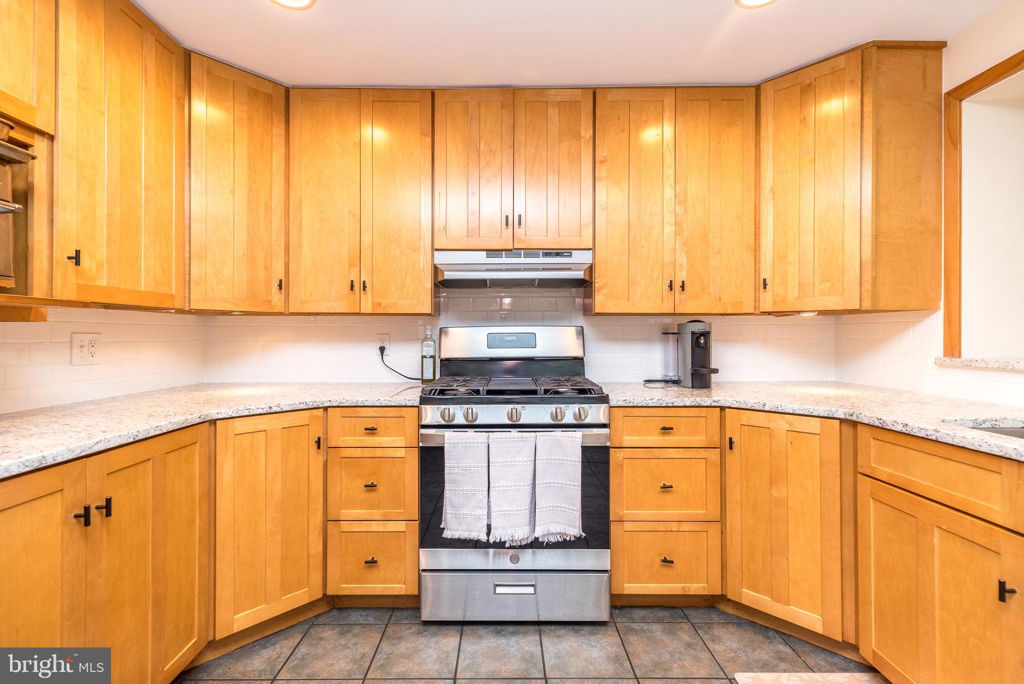 44 Yale Avenue Swarthmore, PA 19081 - Photo 13 of 47 Brand new granite countertop w subway tile.