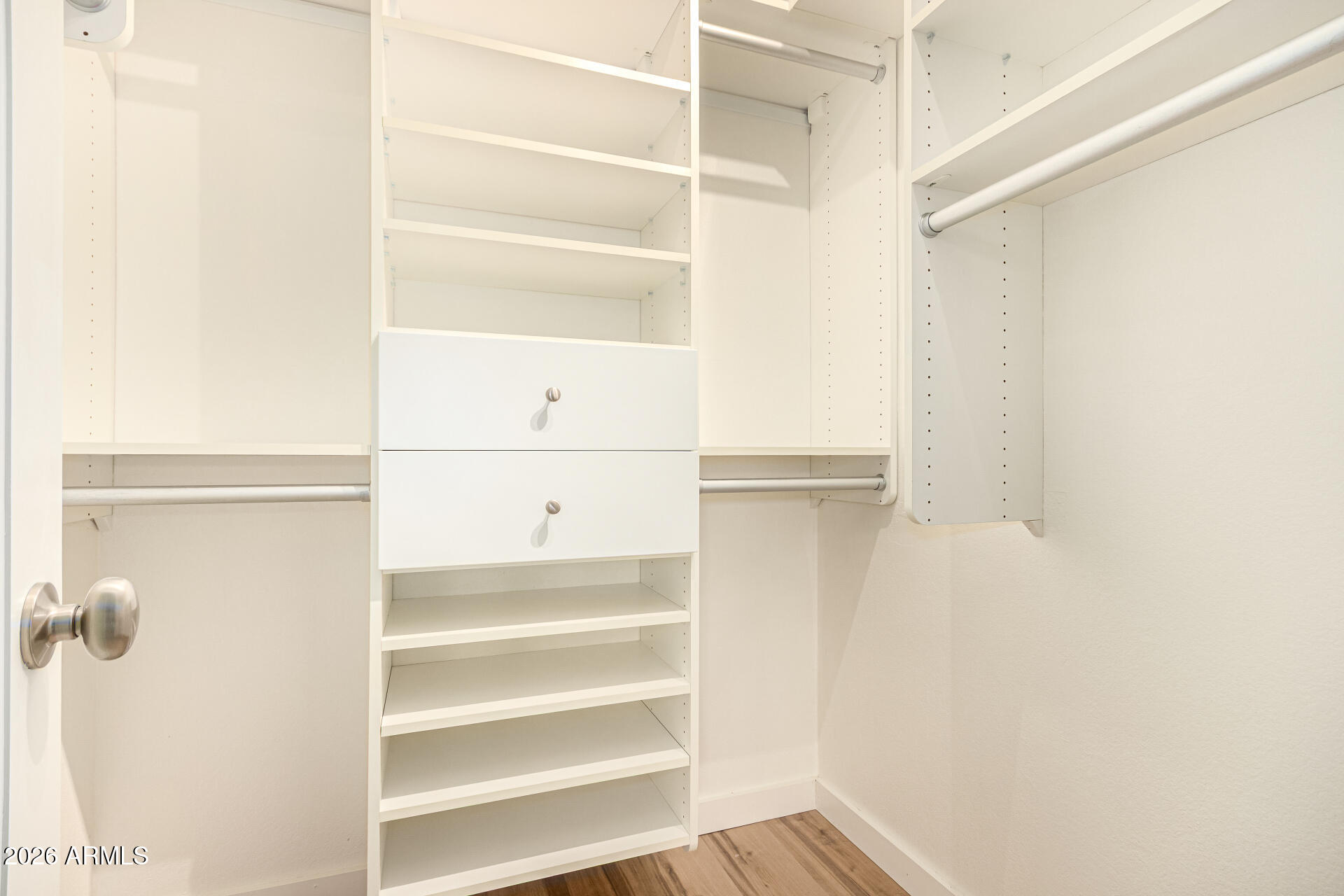 7575 East Indian Bend Road, Unit 2036 Scottsdale, AZ 85250 - Photo 14 of 29 a view of walk in closet with empty racks