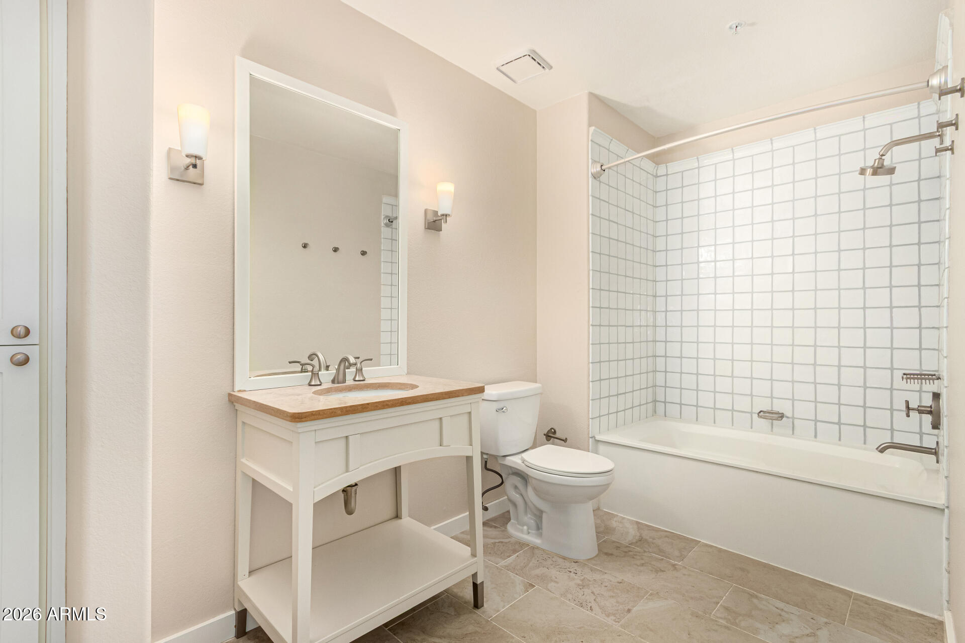 7575 East Indian Bend Road, Unit 2036 Scottsdale, AZ 85250 - Photo 15 of 29 a bathroom with a sink toilet and shower