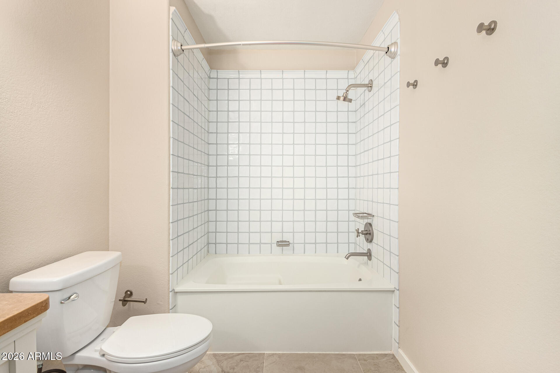 7575 East Indian Bend Road, Unit 2036 Scottsdale, AZ 85250 - Photo 16 of 29 a bathroom with a bathtub and a toilet