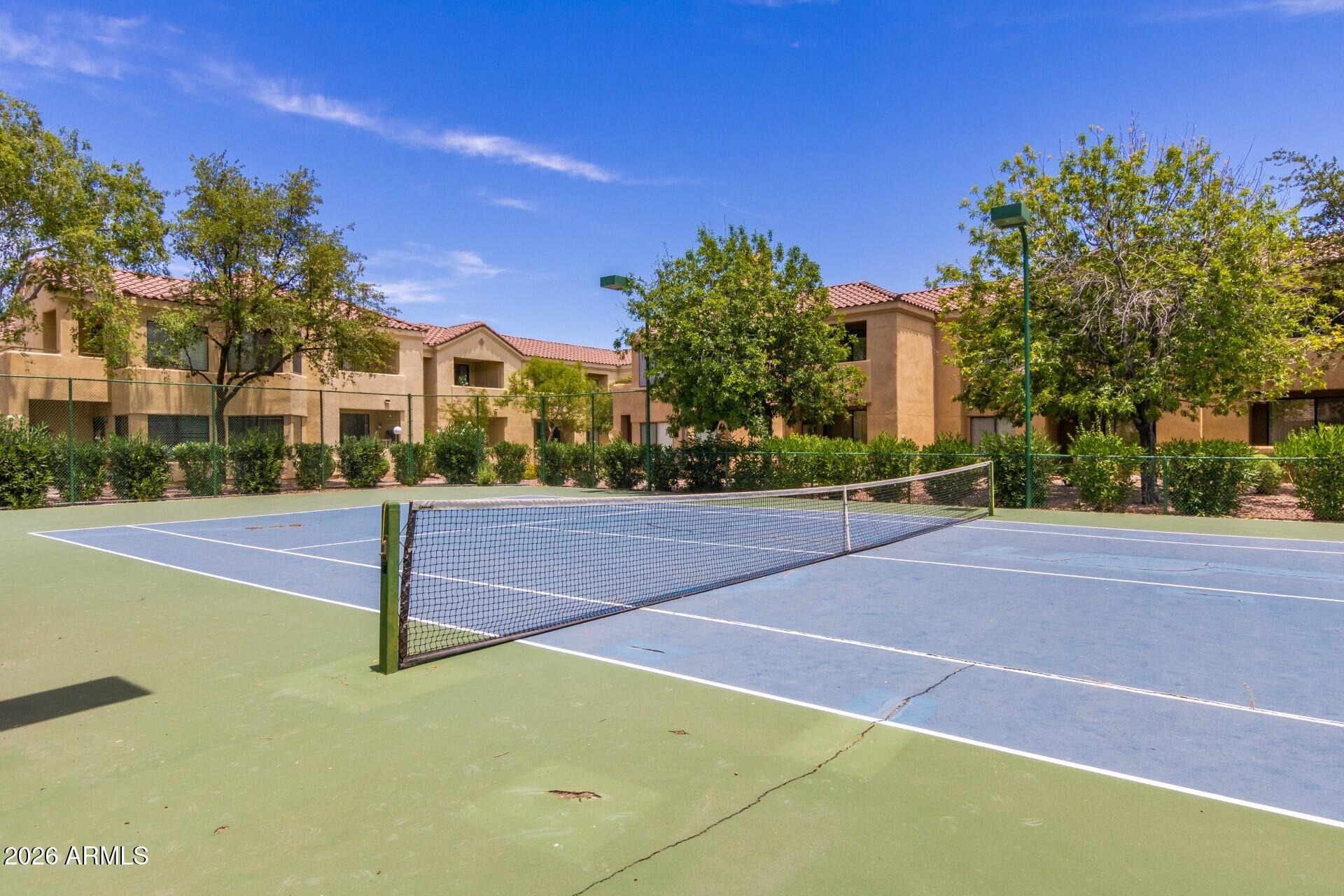 7575 East Indian Bend Road, Unit 2036 Scottsdale, AZ 85250 - Photo 22 of 29 a view of street with houses