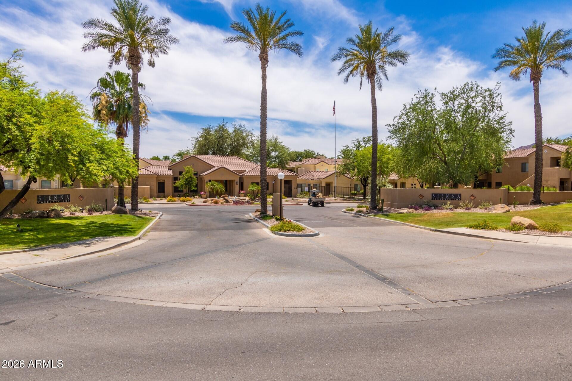 7575 East Indian Bend Road, Unit 2036 Scottsdale, AZ 85250 - Photo 29 of 29 a view of road with palm trees