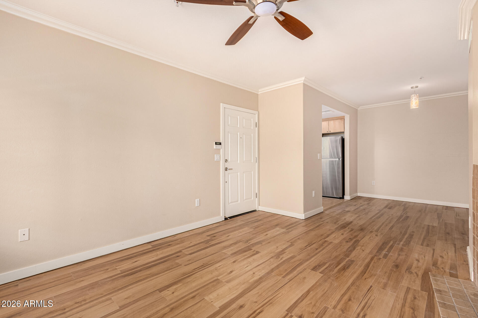 7575 East Indian Bend Road, Unit 2036 Scottsdale, AZ 85250 - Photo 5 of 29 wooden floor in an empty room