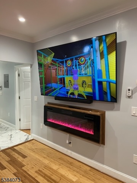 753 South 11th Street Newark, NJ 07103 - Photo 7 of 10 a bedroom with bed and window