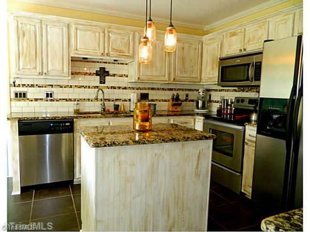 208 Stapleton Way High Point, NC 27265 - Photo 3 of 15 Kitchen. Spacious kitchen with island on stone tile floor