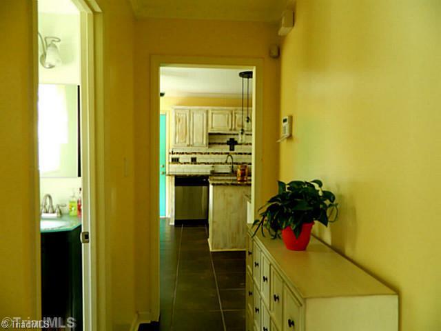 208 Stapleton Way High Point, NC 27265 - Photo 8 of 15 Other. Hallway from living room to kitchen has hall half bath