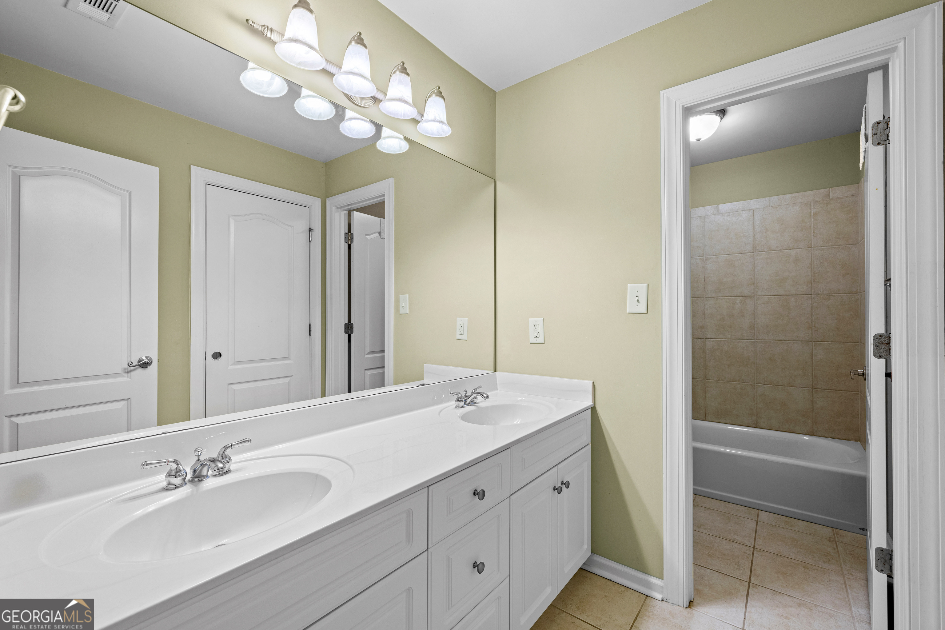 120 Shankhill Ridge Tyrone, GA 30290 - Photo 44 of 54 a bathroom with a double vanity sink and a mirror