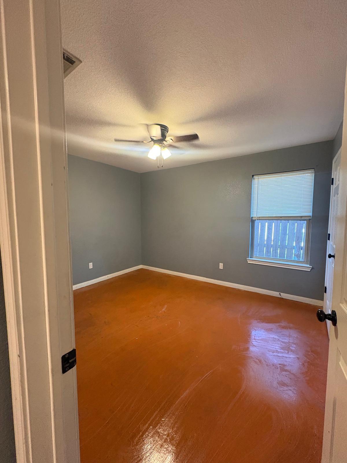 1403 Strickland Street Waco, TX 76705 - Photo 6 of 11 a view of empty room with window