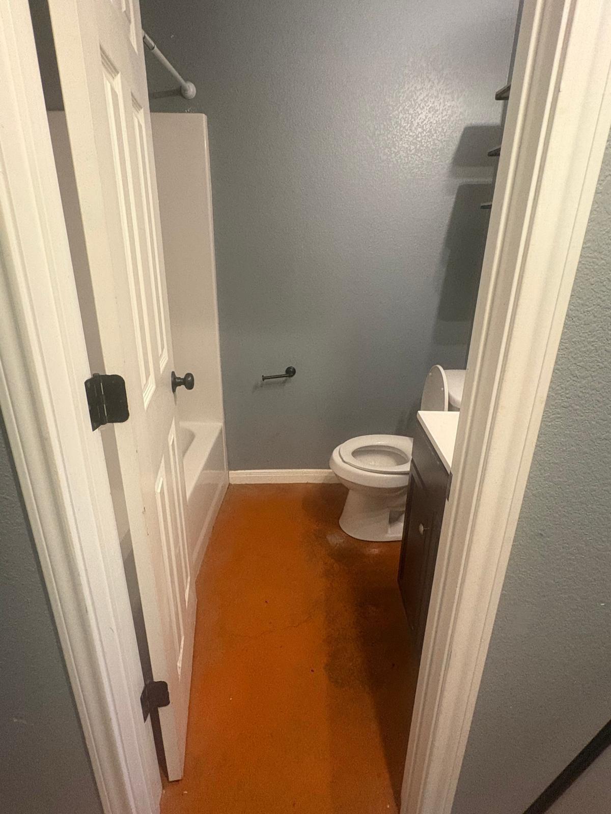 1403 Strickland Street Waco, TX 76705 - Photo 10 of 11 a bathroom with a sink and a toilet
