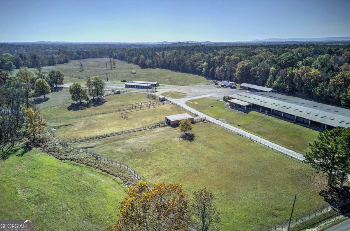 a view of a swimming pool with a yard