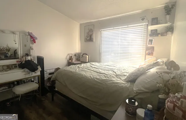 a view of a balcony with two chairs