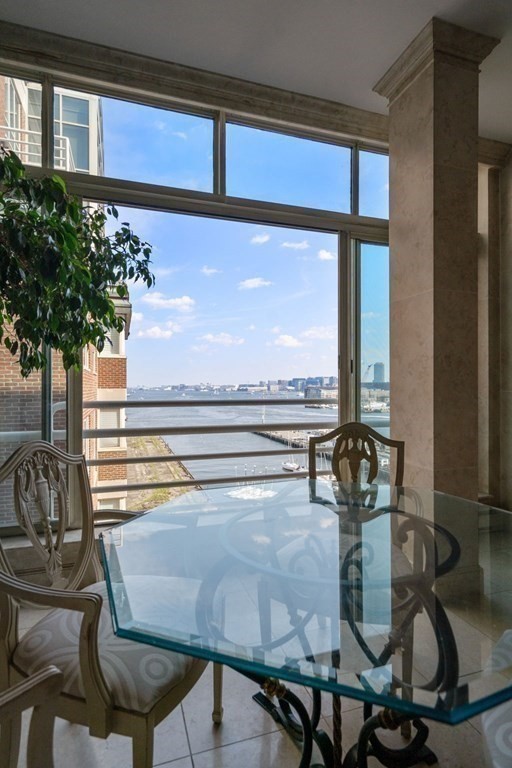197 8th Street, Unit 711 Boston, MA 02129 - Photo 6 of 24 a room with furniture and potted plant
