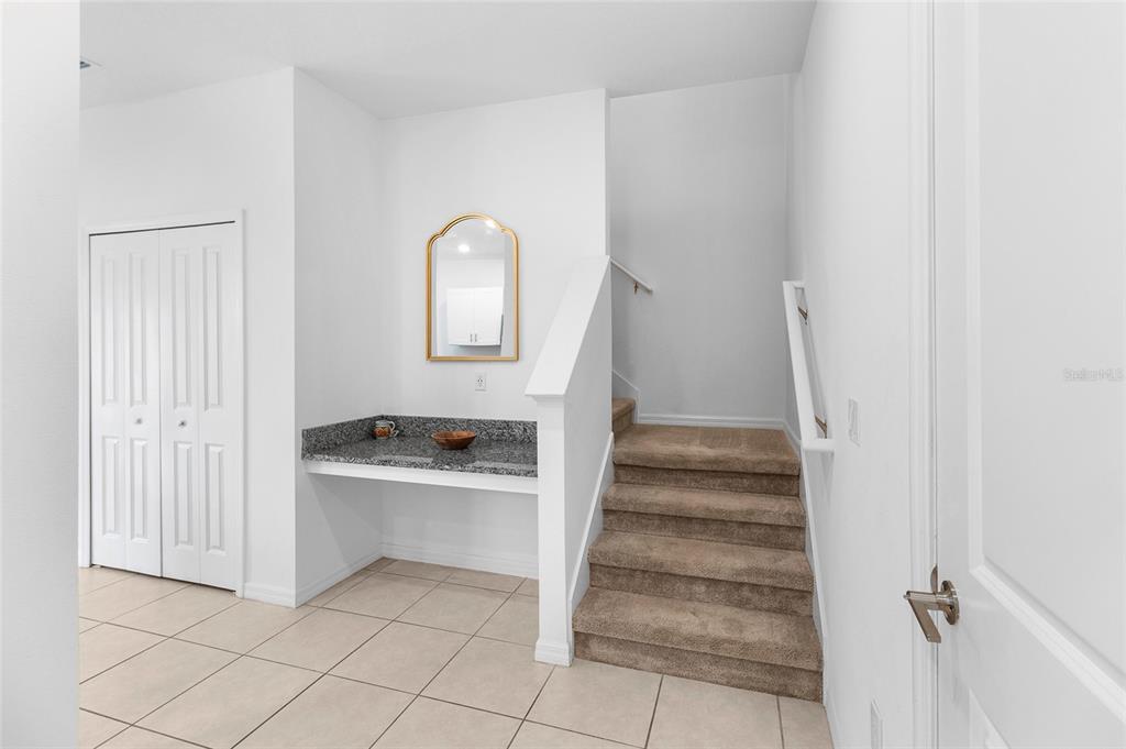 14450 Easy Goer Street Ruskin, FL 33573 - Photo 13 of 27 a view of an entryway with staircase