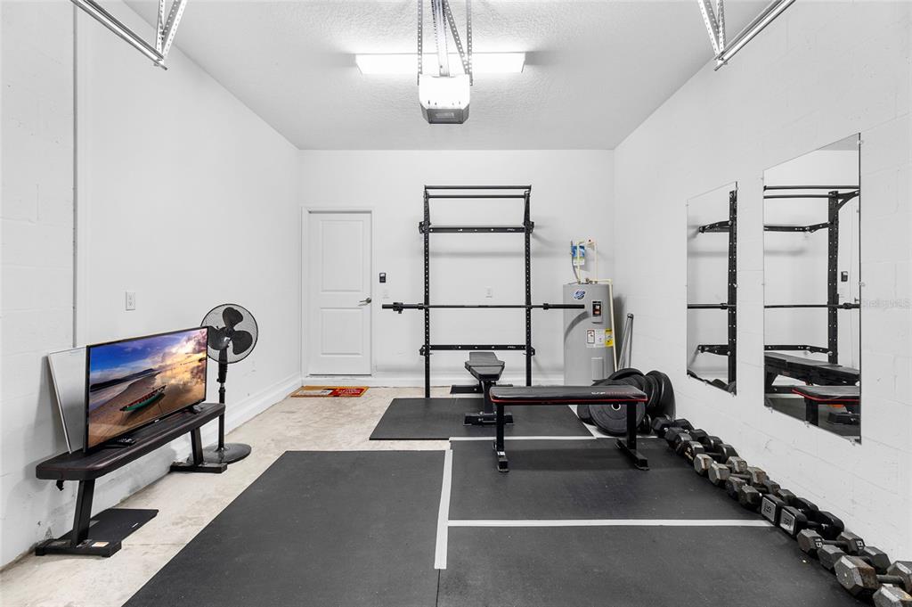 14450 Easy Goer Street Ruskin, FL 33573 - Photo 24 of 27 a view of a room with gym equipment