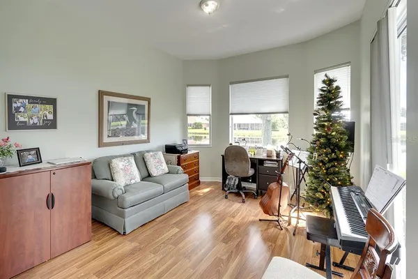 a living room with furniture and a window