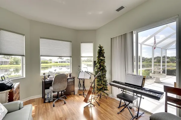 a view of a livingroom with furniture window and outside view