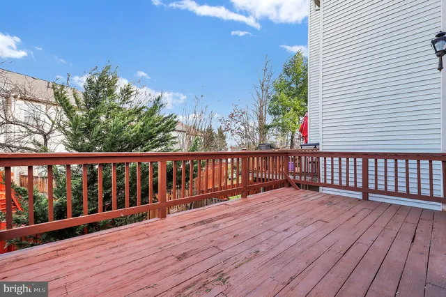 a view of a wooden roof deck
