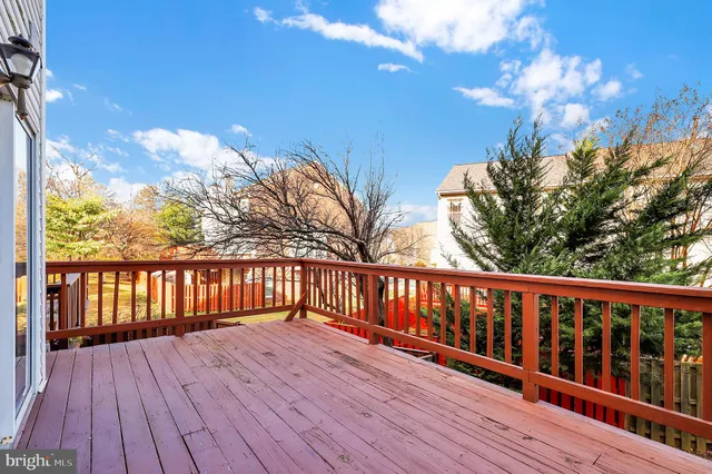 a kitchen with stainless steel appliances granite countertop a refrigerator stove and sink