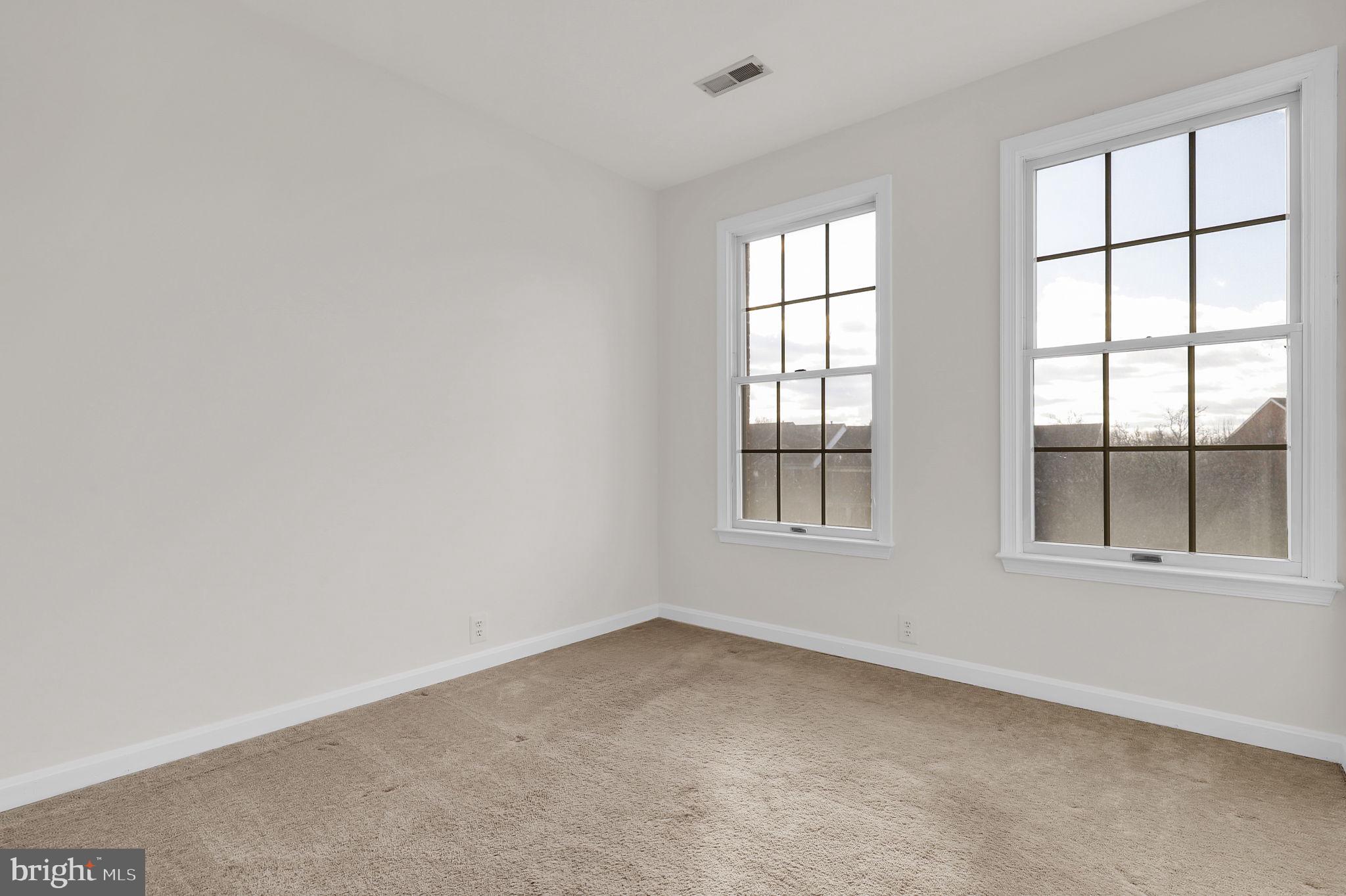 3920 Dunes Way Burtonsville, MD 20866 - Photo 17 of 33 an empty room with a window