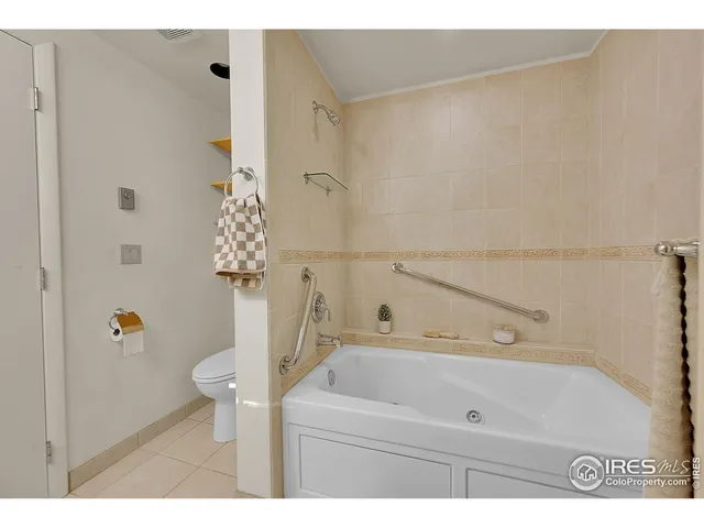 a bathroom with a bathtub and a sink