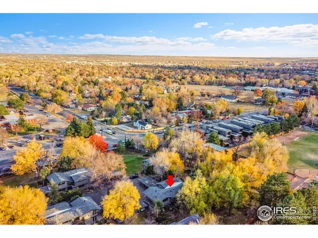 a picture of a room with a white wall and sign