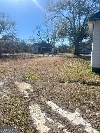 a view of street with houses