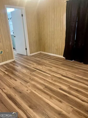 a bathroom with a sink and a window