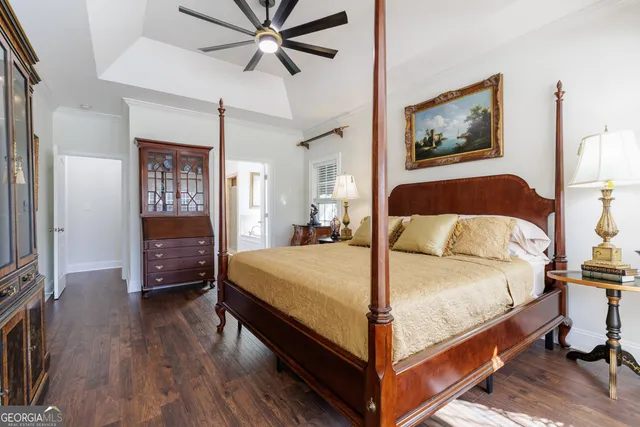 a spacious bathroom with a sink and a mirror