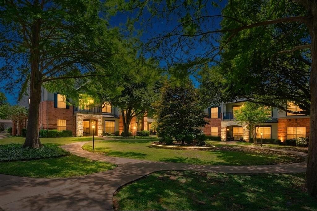 2524 Preston Road, Unit 808 Plano, TX 75093 - Photo 26 of 31 Landscaped courtyard featuring mature trees and a manicured lawn