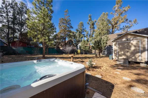 a view of a yard with palm tree